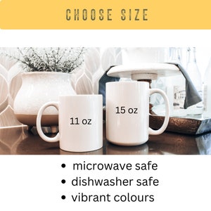 May include: Two white ceramic mugs, one 11 ounce and one 15 ounce, with black text. The mugs are microwave and dishwasher safe and have vibrant colors.