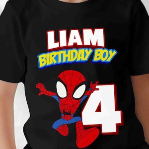May include: Black t-shirt with a red and blue Spiderman graphic, the text "Liam Birthday Boy" and the number 4. 100% cotton.