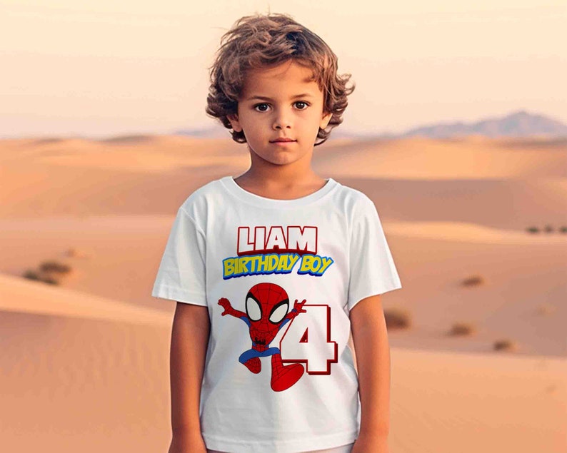 May include: White t-shirt with a red and blue Spiderman graphic, the number 4, and the text "Liam Birthday Boy".