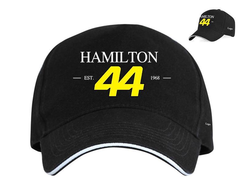 May include: Black baseball cap with a white "HAMILTON" text, a yellow number "44", and the text "EST. 1968" in white.
