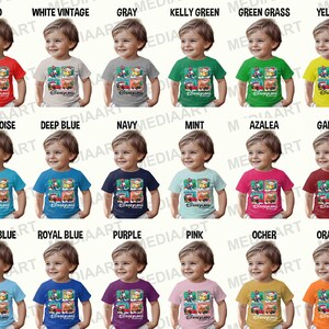 May include: A collage of 20 toddler t-shirts in various colours featuring a Disney print with Mickey Mouse, Minnie Mouse, Donald Duck, Goofy, and Pluto driving cars. The t-shirts are arranged in rows of four, with each row labelled with a colour name.