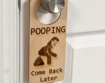 Funny Pooping Door Hanger: Gag Gift Bathroom Sign
