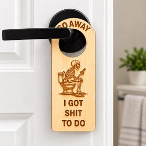 Funny Bathroom Door Hanger, Skeleton on Toilet Sign, Engraved Wood "I Got Sh*t To Do" Do Not Disturb Sign, Housewarming Gift