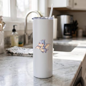 Cute Dinosaur clipart design printed on a tumbler, as an example