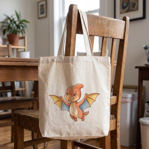Cute Dinosaur clipart design printed on a tote, as an example