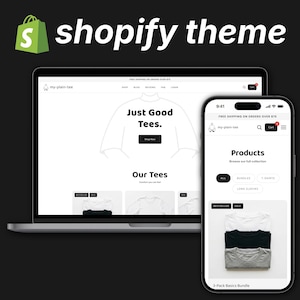 May include: A laptop and smartphone display a Shopify theme with a minimalist e-commerce website design. The website showcases t-shirts, with the text "Just Good Tees." The Shopify logo is in the upper left corner.