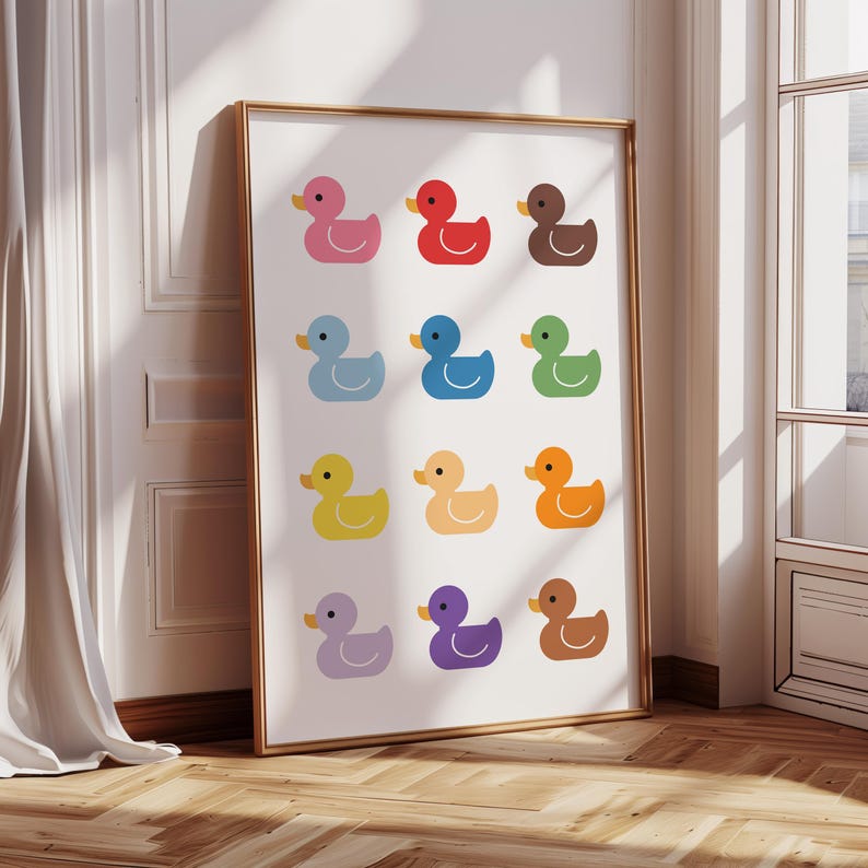 May include: A colorful print featuring 12 rubber duckies in a grid pattern. The ducks are in various colors, including red, blue, green, yellow, orange, purple, and brown.