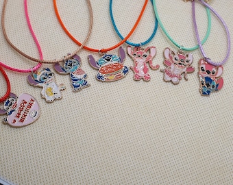 Stitch enamel pendant on a waxed cord necklace. 19 inch.