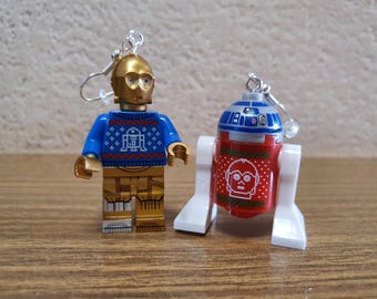 Orecchini natalizi con le minifigure di R2D2 e C3PO.