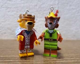 Orecchini con le minifigure Disney di Robin Hood e del Principe Giovanni.