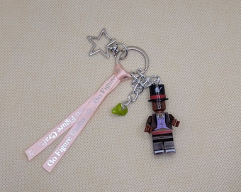 Portachiavi/ciondolo per borsa con minifigure del Dottor Facilier, ispirato a La Principessa e il Ranocchio. Possibilità di personalizzazione.