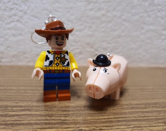 Toy Story Woody and Hamm minifigure earrings.