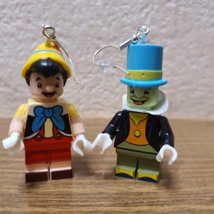 Disney Pinocchio and Jiminy Cricket minifigure earrings.