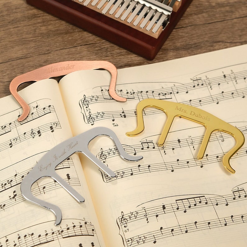 The perfect music score holder, available in three colors: gold, rose gold, and silver.