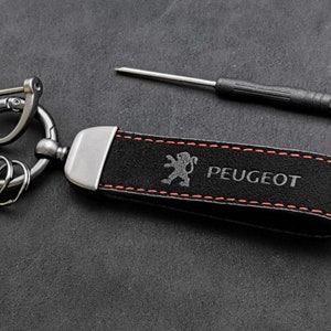 Peugeot 2021 Schlüsselanhänger Factory aus versilbertem Metall : :  Auto & Motorrad