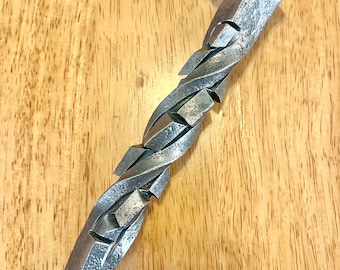 Hand cut/ twisted railroad spike bottle opener