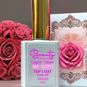 May include: A clear bottle of Beauty Clutters Super Shine No Wipe Top Coat nail polish. The bottle is 15 ml and is labeled as soak off UV/LED.