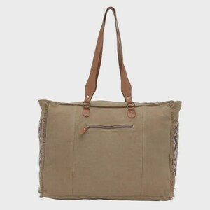 May include: A large, olive green tote bag with brown leather handles and accents. The bag features a zippered pocket on the front and decorative fringing along the sides. The bag is designed for carrying items.