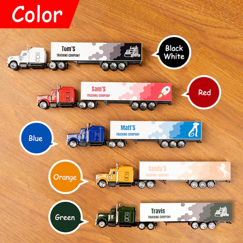 May include: A set of toy semi-trucks with different coloured trailers. Each trailer has a company name and logo. The colours are black and white, red, blue, orange, and green.