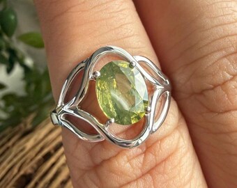 Silver Ring with Natural Oval Yellowish Green Zircon