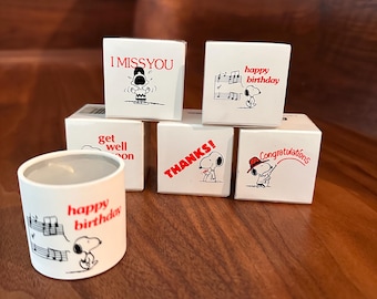 Snoopy Peanuts Love Lights Tea candles. 5 messages: Happy Birthday, Thanks! Congratulations, I MISS YOU and Get Well Soon.  Sold separately