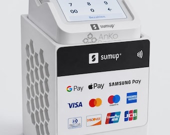 May include: A white SumUp payment terminal dock with a honeycomb side pattern. The front panel displays the SumUp logo and various payment method icons including G Pay, Apple Pay, Samsung Pay, Visa, Mastercard, Maestro, American Express, and others.