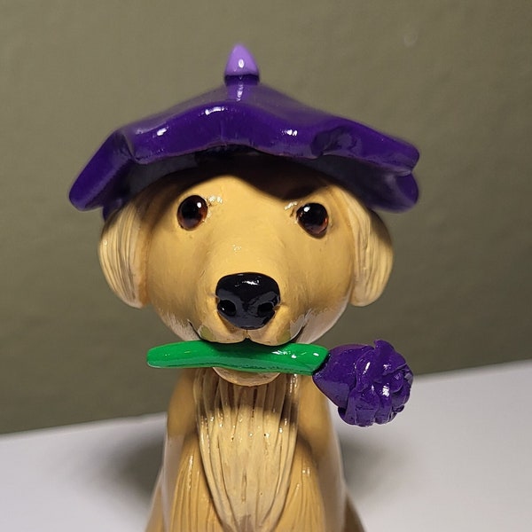 Golden retriever wearing umbrella hat and rain boots