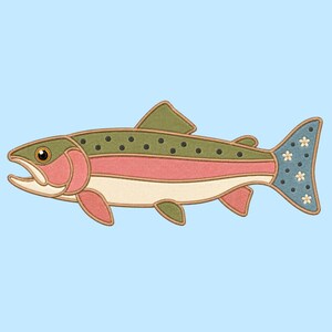 May include: An embroidered patch shaped like a trout fish with a green back featuring black spots, a pink lateral stripe, and a cream-colored belly. The tail fin is blue with small black dots and white flower-shaped accents, outlined in tan thread.