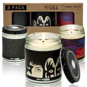 May include: Three-pack of black and white KISS band-themed candles in glass jars with lids. The candles are made of coconut wax and are non-toxic. The jars have a black and white image of the band members on the front. The text "BACK TO BASICS CANDLES" is printed on the bottom of the jars.