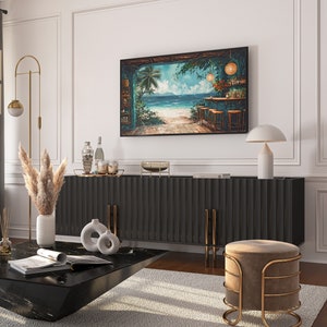 May include: A dark wood cabinet with a black top and gold accents. The cabinet has a tropical beach scene painting above it with a bar and palm trees. There is a white ceramic vase with dried pampas grass on the left side of the cabinet. A small round table with a black top and gold legs is in front of the cabinet. There is a white ceramic vase with a round shape on the table.