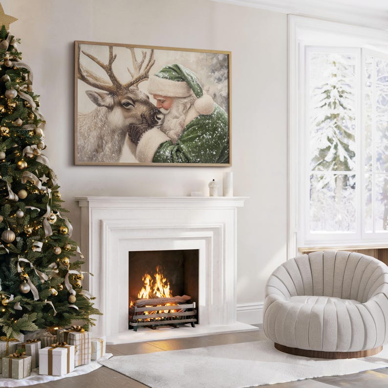 May include: A framed Christmas-themed artwork depicts Santa Claus embracing a reindeer. The artwork hangs above a white fireplace with a burning fire. A decorated Christmas tree and a cozy armchair complete the festive scene.