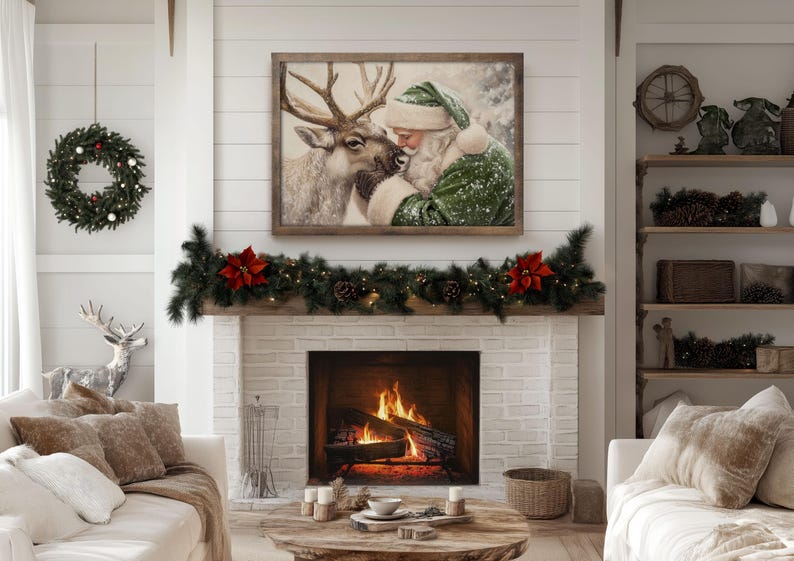 May include: A cozy living room scene with a fireplace, adorned with a Christmas wreath and garland. A framed artwork depicts Santa Claus and a reindeer. The room is decorated in neutral tones, creating a warm and inviting holiday atmosphere.
