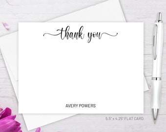 May include: A white thank you card with black calligraphy that reads "thank you". The card is 5.5 inches by 4.25 inches and has the name Avery Powers printed below the calligraphy. The card is handmade with love in NYC by Labelly Studio.