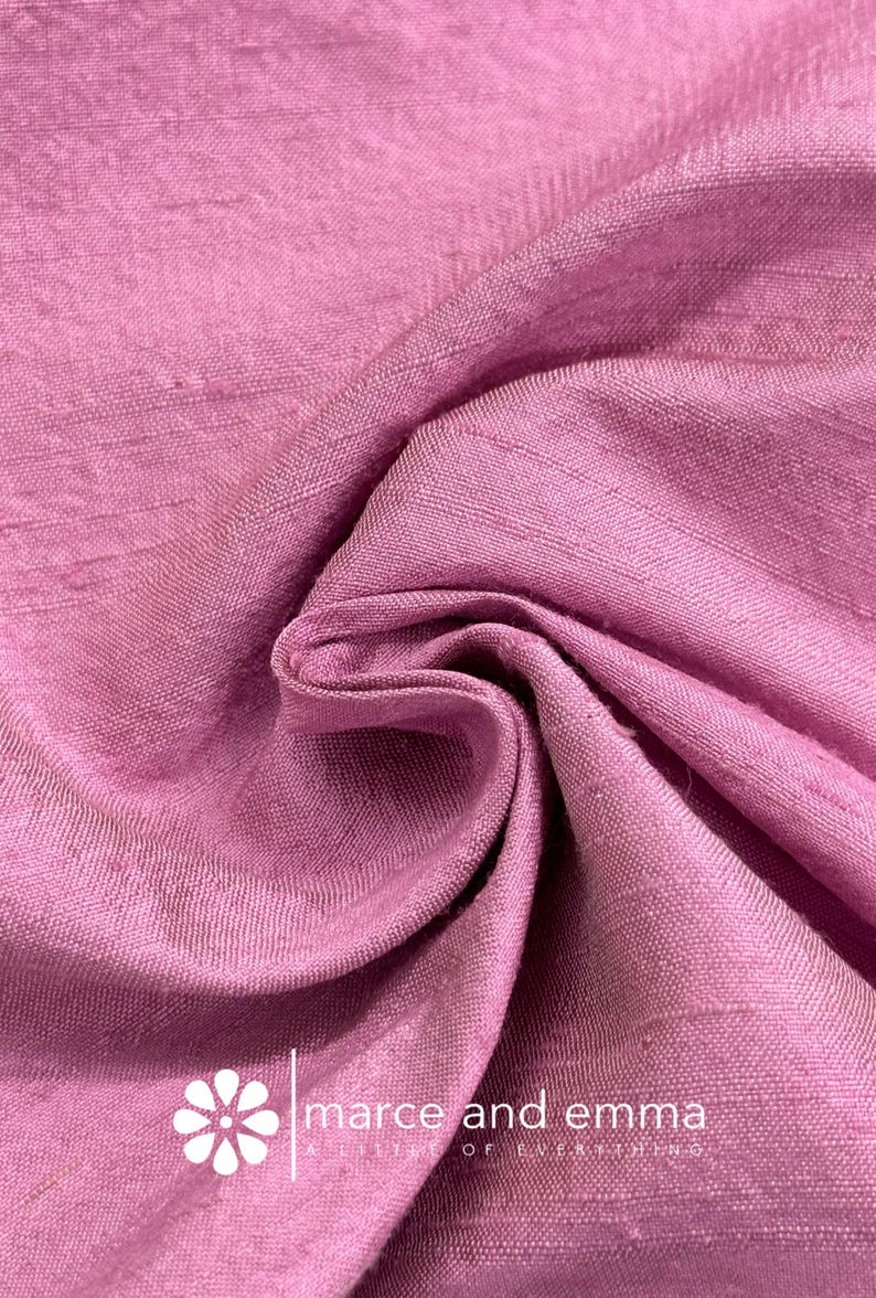 Close-up of luxurious dupioni silk fabric showing its natural iridescence and unique textured weave, capturing the subtle shimmer and color variations under soft lighting, ideal for Etsy display images to highlight the fabric’s elegance, perfect for dressmaking, wedding gowns, and high-end craft projects, showcasing the premium quality and fine threads of this 100% silk material.