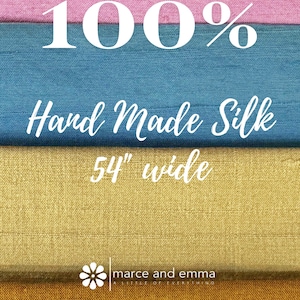 May include: Image of layered silk fabric in pink, blue, yellow, and gold. The text reads "100% Hand Made Silk 54" wide". The Marce and Emma logo is at the bottom. The silk appears to be a high-quality textile.