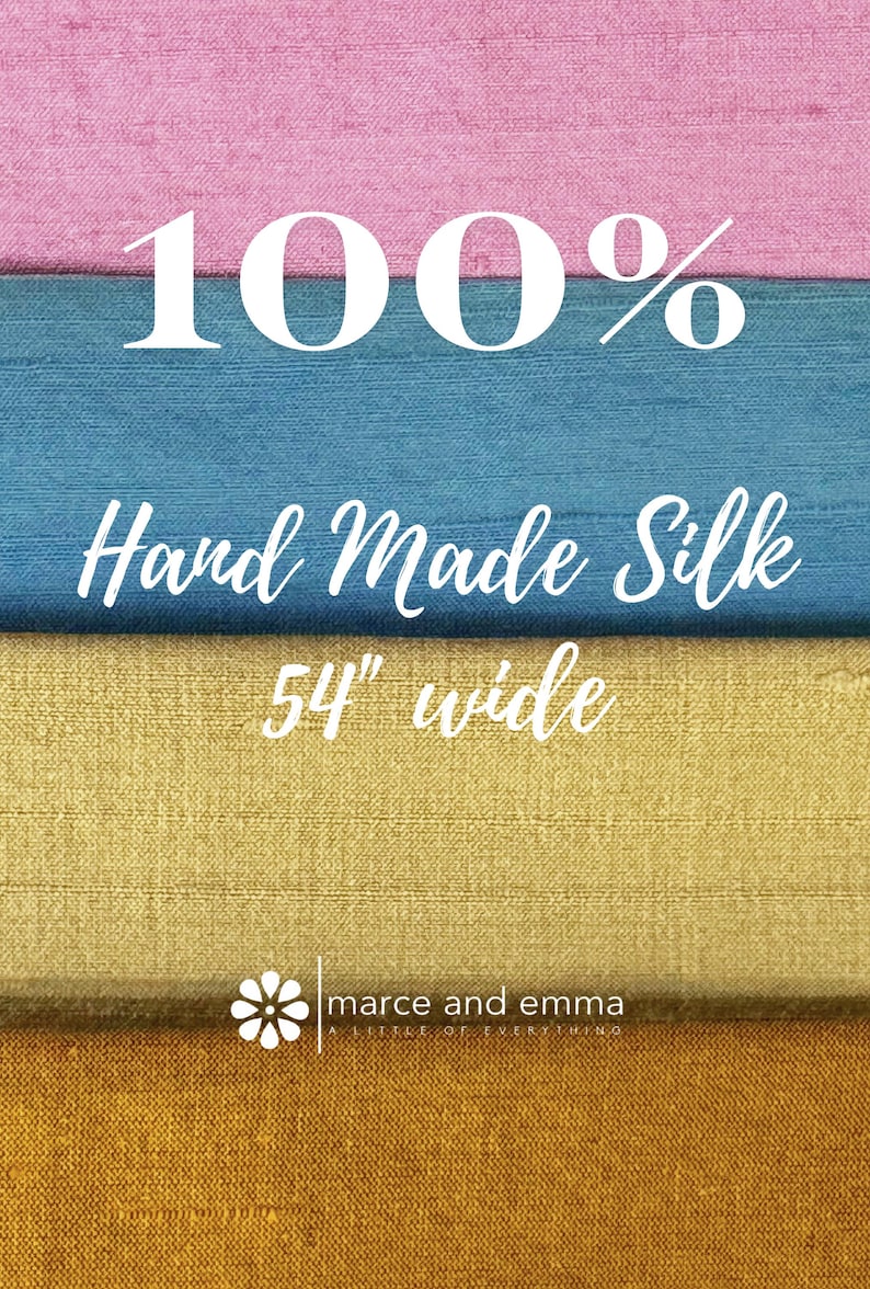 May include: Image of layered silk fabric in pink, blue, yellow, and gold. The text reads "100% Hand Made Silk 54" wide". The Marce and Emma logo is at the bottom. The silk appears to be a high-quality textile.