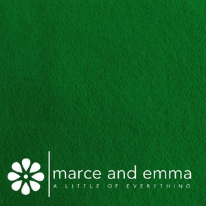 May include: A green background with a white stylized flower and the text "marce and emma A LITTLE OF EVERYTHING" in white.