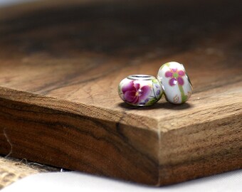 Bead, porcelain, white and pink, 10mm round with painted pink flowers. Sold per pkg of 5.