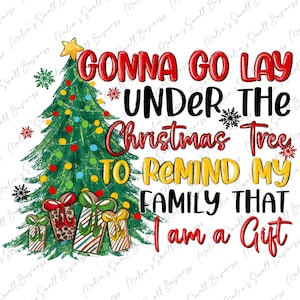 May include: A Christmas-themed graphic with a green Christmas tree, red and yellow gift boxes, and the text "GONNA GO LAY UNDER THE CHRISTMAS TREE TO REMIND MY FAMILY THAT I AM A GIFT."
