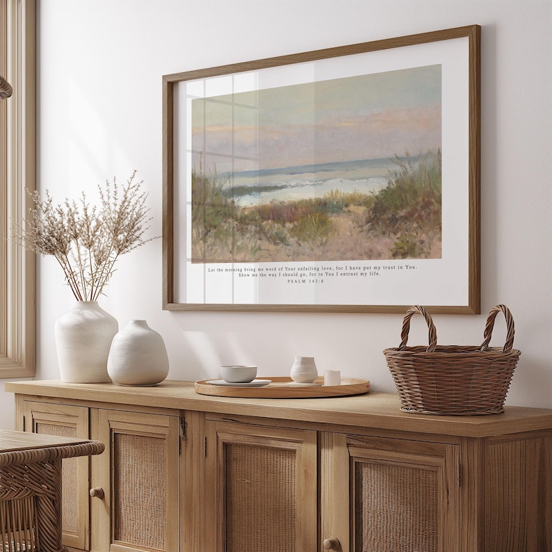 May include: A framed print of a seascape painting with a quote from Psalm 139:9, "Let the morning bring me the word of your unfailing love, for I have put my trust in You. Show me the way I should go, for to You I entrust my life."