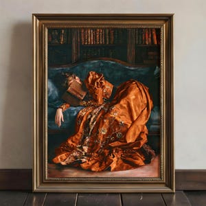 May include: A framed oil painting depicting a person in a long, rust-coloured gown with floral embroidery, reclining on a dark teal sofa. The person has a book resting over their face, with a dark wooden bookshelf filled with books in the background.
