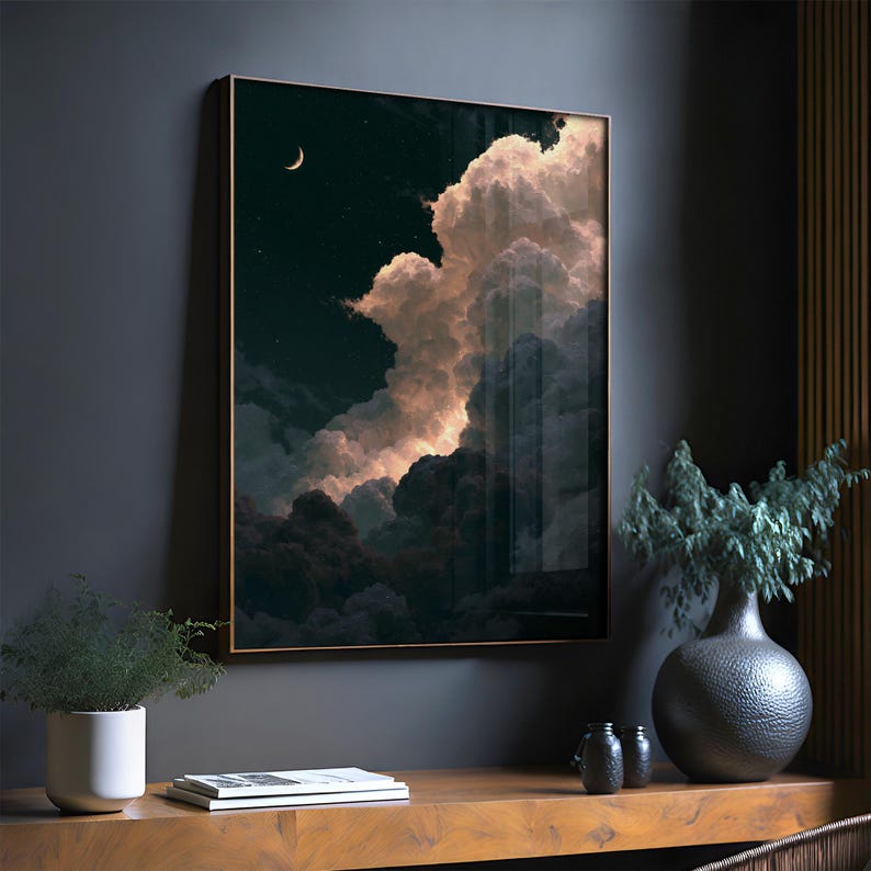 May include: A rectangular wall art print featuring a night sky with a crescent moon and scattered stars above large, voluminous clouds illuminated in soft pink and white tones against a deep dark blue and black background.