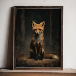 May include: A framed art print featuring a detailed painting of a fox. The fox has reddish-orange fur and is seated, facing forward against a dark forest background. The frame is dark brown.