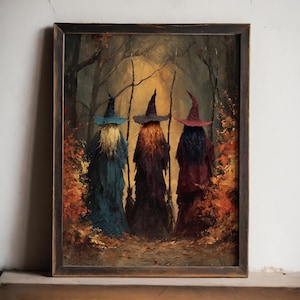 May include: A framed oil painting depicting three figures in pointed hats standing in a forest with autumn foliage. The figures wear long robes in shades of teal, purple, and dark red, with long hair flowing down their backs in blonde, orange, and black.