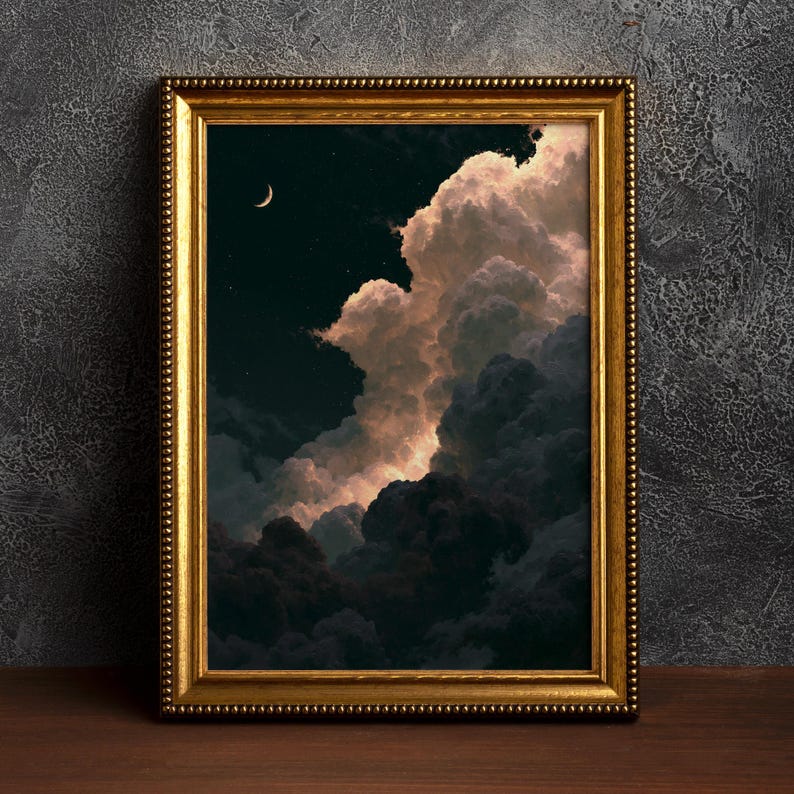 May include: A rectangular wall art piece in a gold ornate frame featuring a dark night sky with a crescent moon and stars. Large, voluminous clouds dominate the composition, illuminated with soft pink and white light against deep shadows.