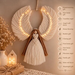 May include: A macrame angel wall hanging with cream-colored cord wings illuminated by integrated warm LED lights. The figure features brown cord hair and a cream-colored cord dress. Text on the right lists gift and decor categories.