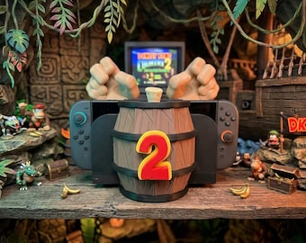Switch 2 and OLED stand Donkey Kong style – 3D printed barrel with monkey hands & game compartment