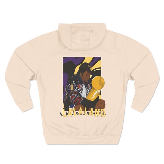 Kobe holding top trophy shirt