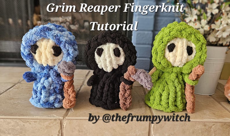 May include: Three finger-knitted Grim Reaper figures in blue, black, and green. Each figure has a white face, black eye holes, and a scythe. The text "Grim Reaper Fingerknit Tutorial" is at the top, and "by @thefrumpywitch" is at the bottom.
