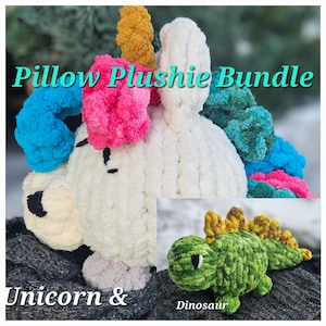May include: A plush unicorn and dinosaur pillow bundle. The unicorn is white with blue, pink, and yellow yarn accents. The dinosaur is green with yellow accents.
